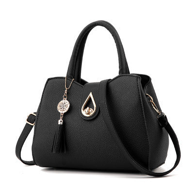 Frange d'Or – Sac Porté Main avec Détail Bohème
