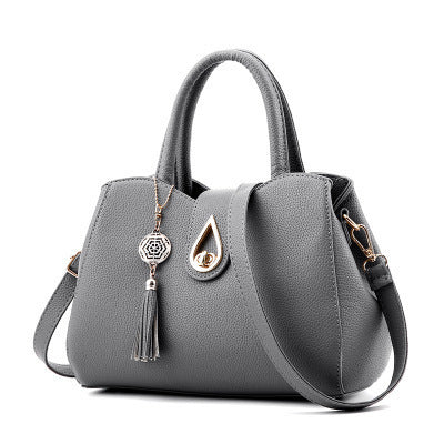 Frange d'Or – Sac Porté Main avec Détail Bohème