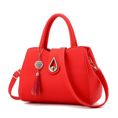 Frange d'Or – Sac Porté Main avec Détail Bohème